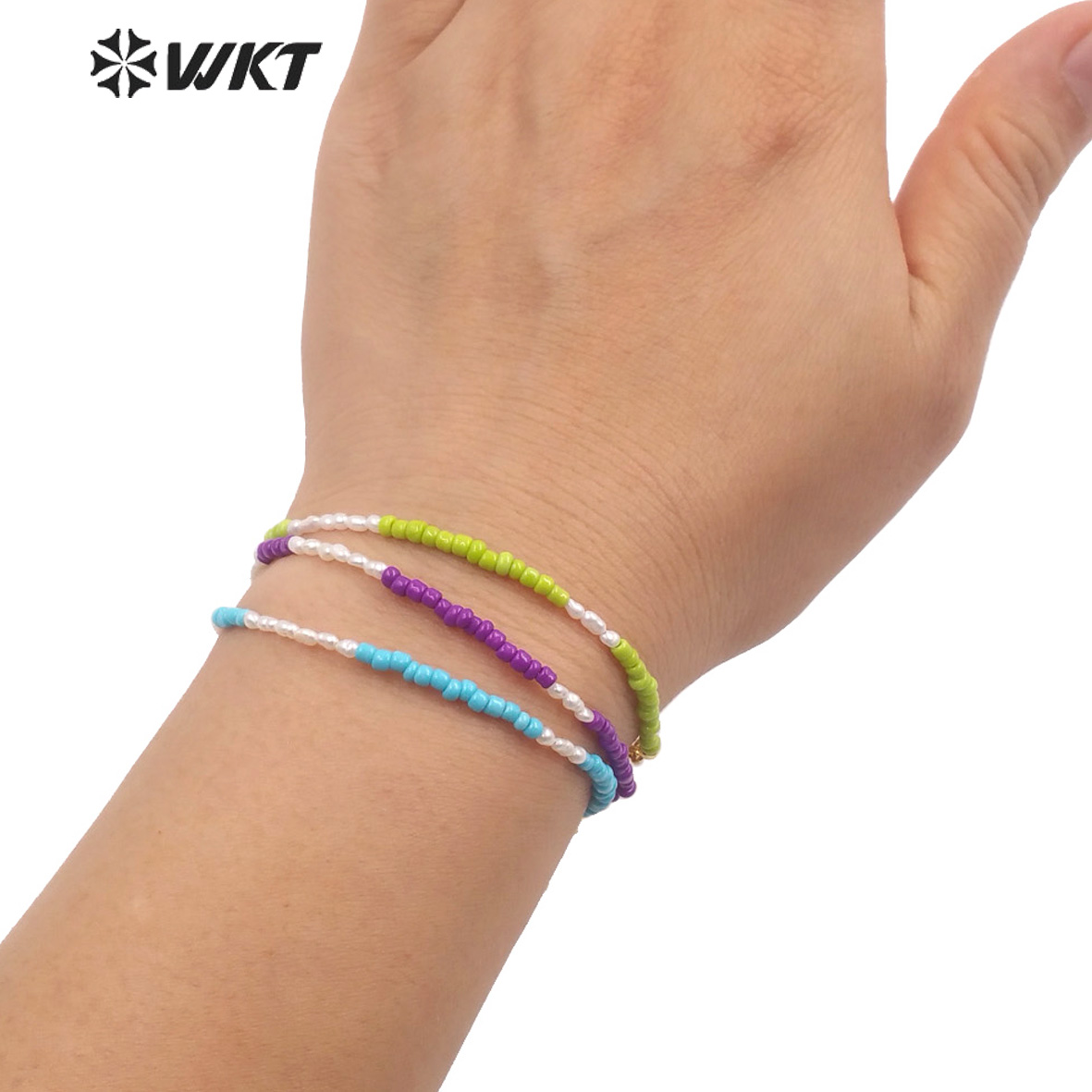 WT-MPB079 Women Elegant Tiny 2 - Ceramic Link Bracelet 评论和价格